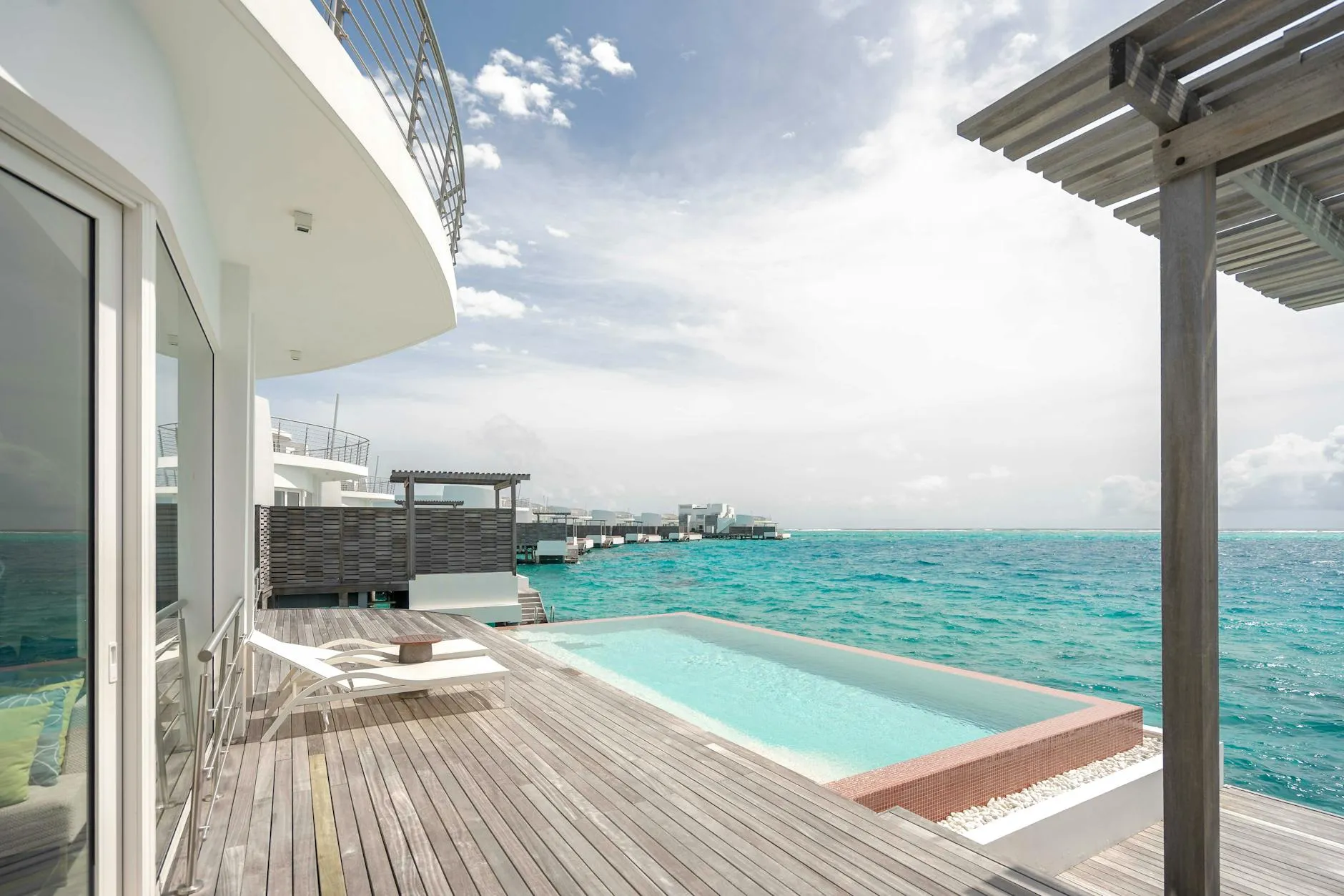 A beachfront villa on turquoise Caribbean water